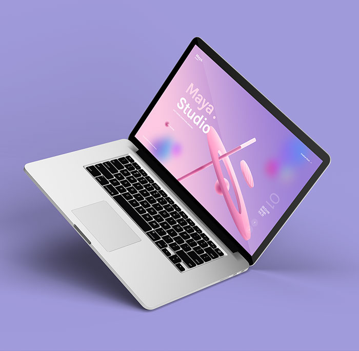 Ein Laptop-Computer auf violettem Hintergrund.